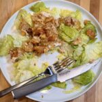 Baked Chicken Caesar - This easy baked chicken takes everything you love about a Caesar salad and turns it into a comforting, oven-baked dinner. Crunchy, cheesy, buttery goodness with minimal prep.