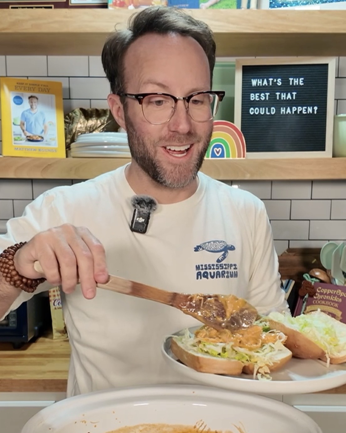 Matthew preparing buffalo ranch chicken sandwiches