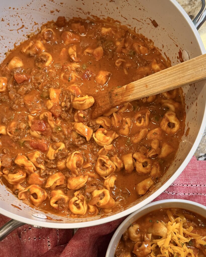 Chili Cheese Tortellini cooking in a pan