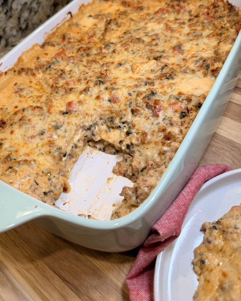 White Spinach Lasagna - Creamy, hearty, and packed with flavor, this white lasagna is made simple with oven-ready noodles and a rich sausage filling. Perfect for feeding a crowd or stocking the freezer.