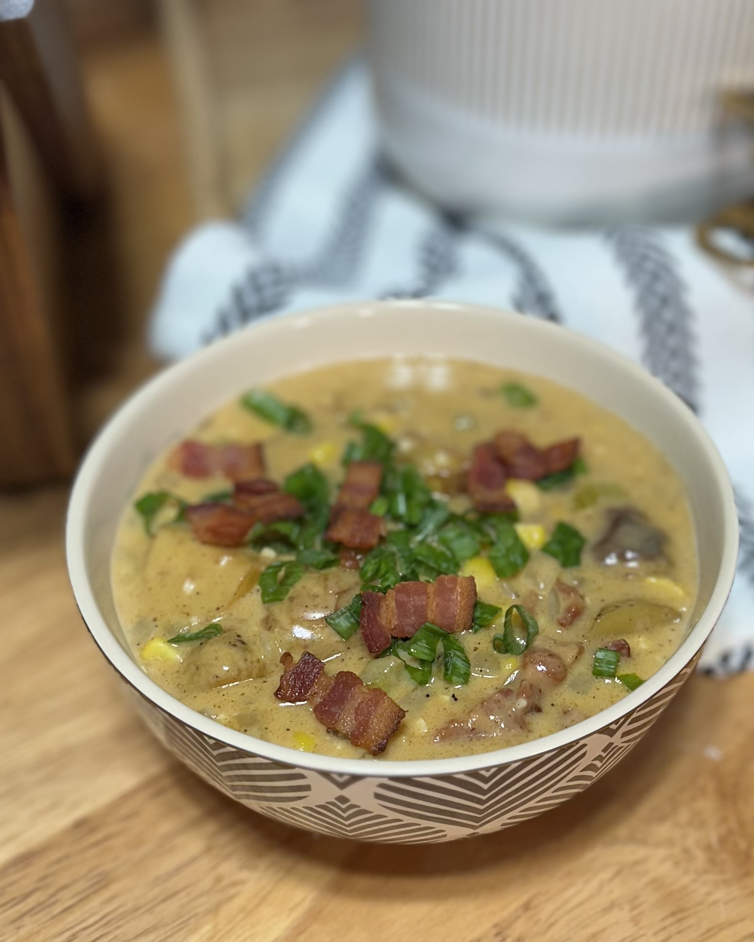 Chowder in bowl on table
