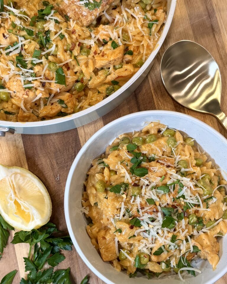 Lemony Parmesan Chicken Orzo in a bowl and pan on the table