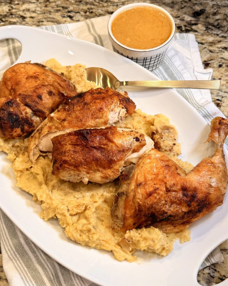 Spatchcock Chicken on plate on counter from Keep It Simple Y'all Every Day Cookbook by Matthew Bounds