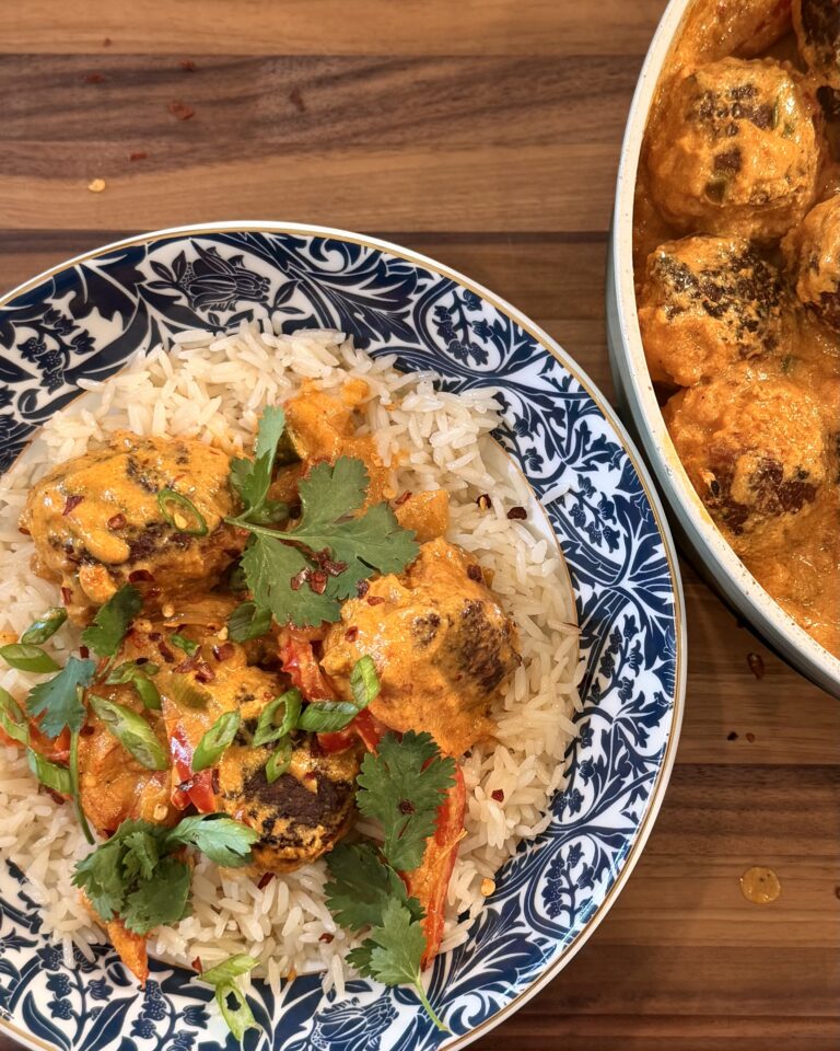 Coconut Curry Chicken Meatballs from Keep It Simple Y'all Every Day in a bowl garnished with cilantro