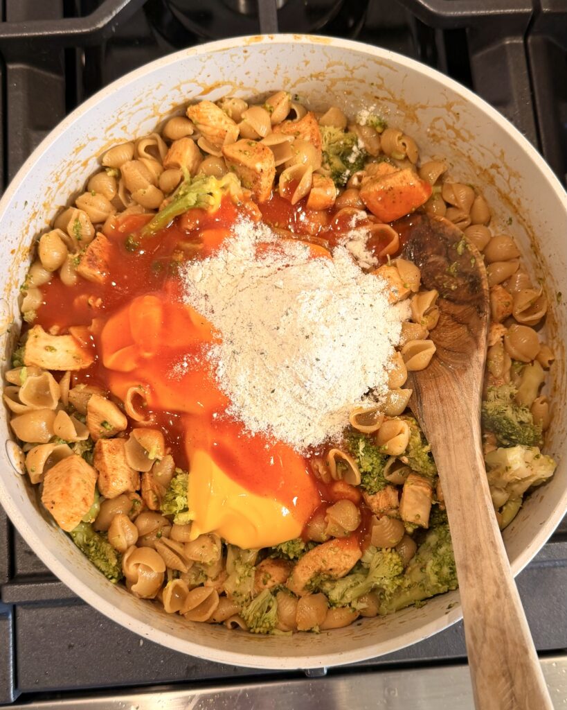 Cheese, hot sauce, and ranch seasoning gets added to the skillet