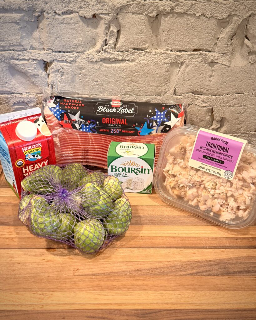 Ingredients for Cheesy Bacon Chicken and Brussel Sprouts sit on the kitchen counter.