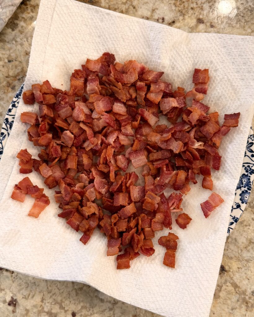 Bacon drains after being cooked for Cheesy Bacon Chicken and Brussels Sprouts cooked by Your Barefoot Neighbor Matthew Bounds.