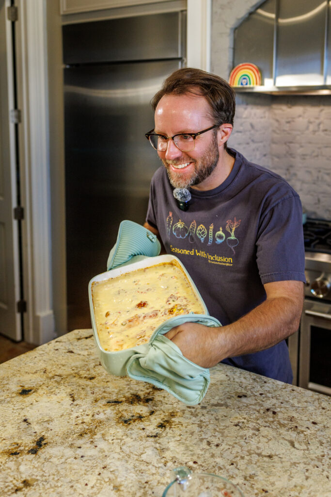 Your Barefoot Neighbor Matthew Bounds puts his Baked Swim Queso Chicken in the oven
