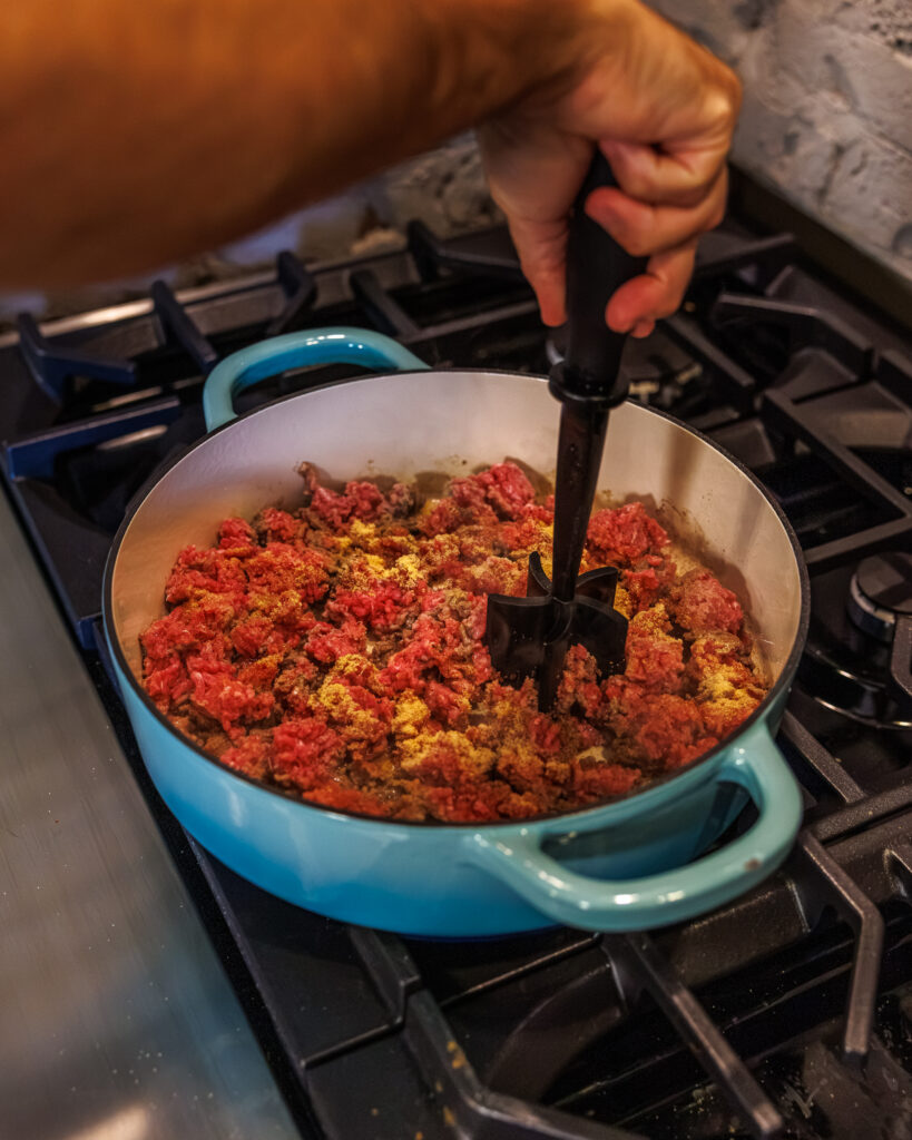 Matthew Bounds, creator of Your Barefoot Neighbor, cooks the beef for his Cheddar Biscuit Beef Pie from Keep It Simple Y'all Every Day