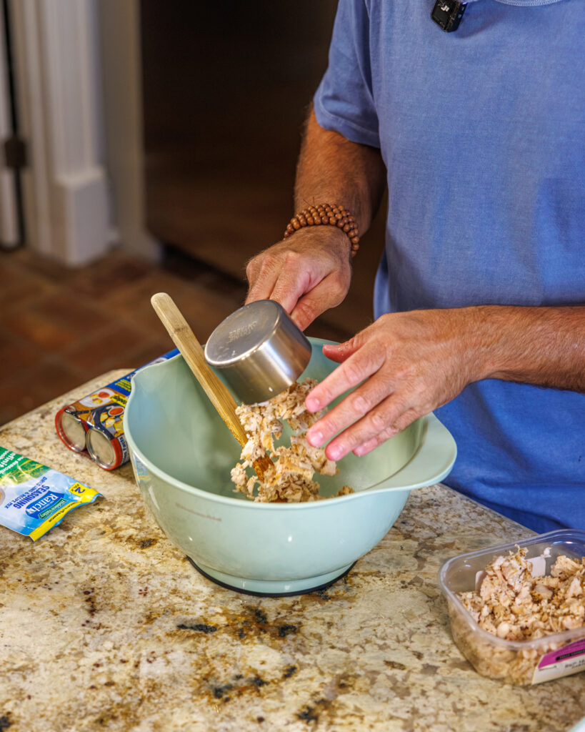 Matthew Bounds, creator of Your Barefoot Neighbor, prepares ingredients for his Chicken Bacon Ranch Rolls