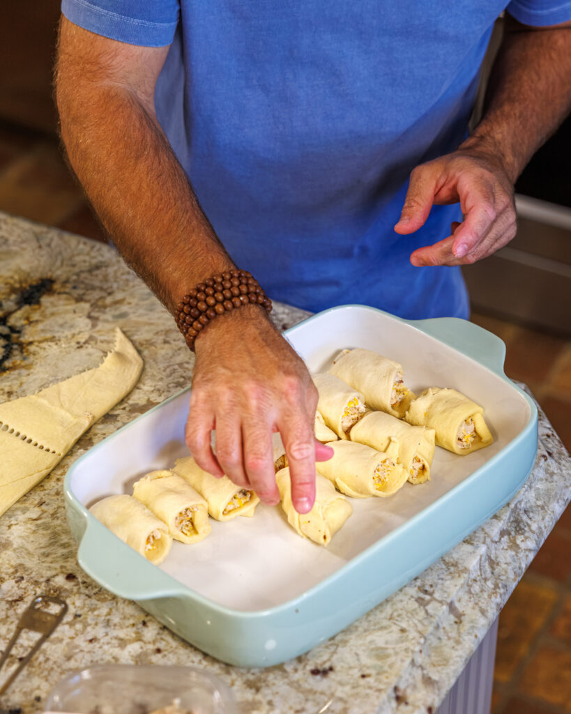 Matthew Bounds, creator of Your Barefoot Neighbor, prepares ingredients for his Chicken Bacon Ranch Rolls
