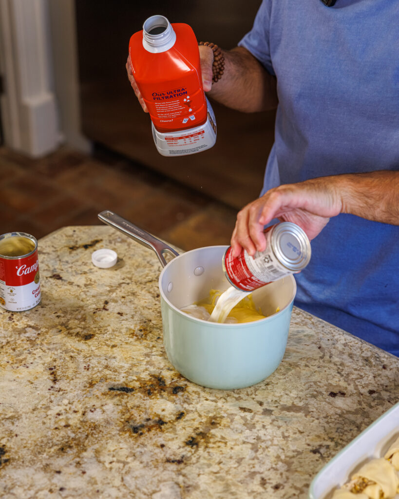 Matthew Bounds, creator of Your Barefoot Neighbor, prepares ingredients for his Chicken Bacon Ranch Rolls