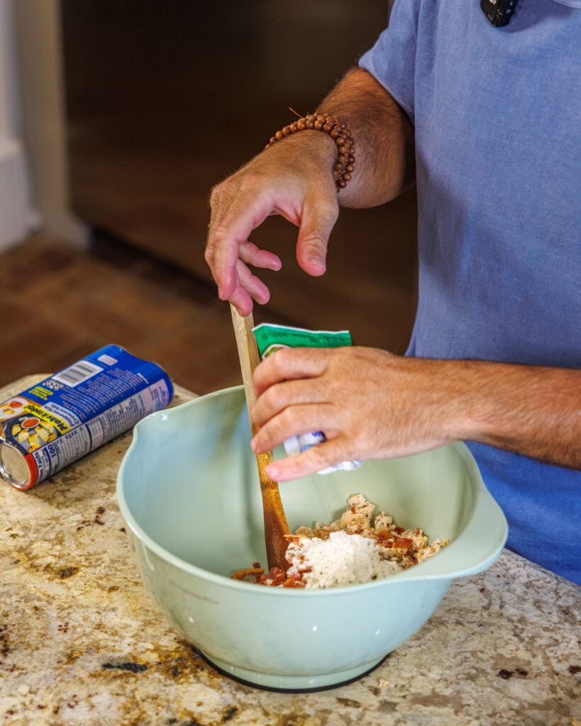 Matthew Bounds, creator of Your Barefoot Neighbor, prepares ingredients for his Chicken Bacon Ranch Rolls