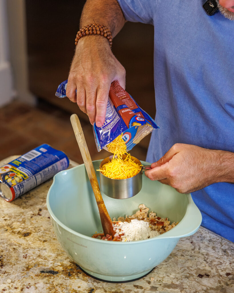 Matthew Bounds, creator of Your Barefoot Neighbor, prepares ingredients for his Chicken Bacon Ranch Rolls