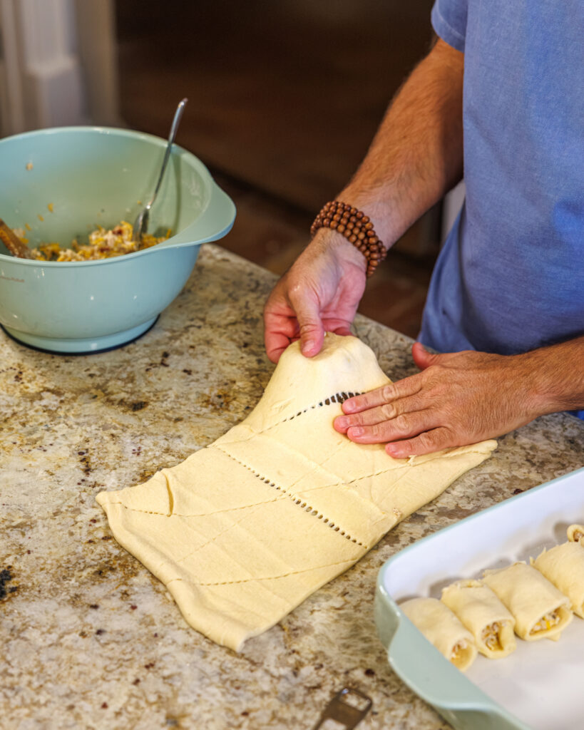 Matthew Bounds, creator of Your Barefoot Neighbor, prepares ingredients for his Chicken Bacon Ranch Rolls