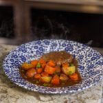 Hamburger Steaks and Gravy by Your Barefoot Neighbor Matthew Bounds on a plate