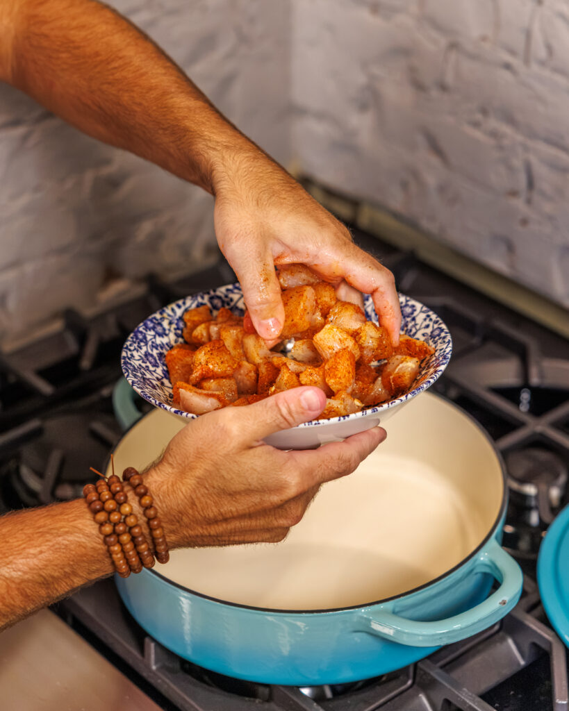 Matthew Bounds, creator of Your Barefoot Neighbor, prepares the chicken for his One Pot Corn & Pimento Orzo