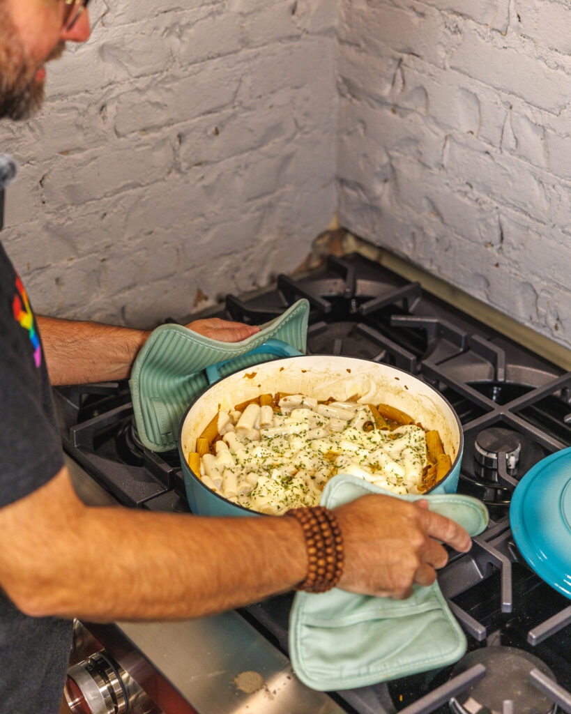 Matthew Bounds, creator of Your Barefoot Neighbor, finishes cooking his One Pot French Onion Pasta