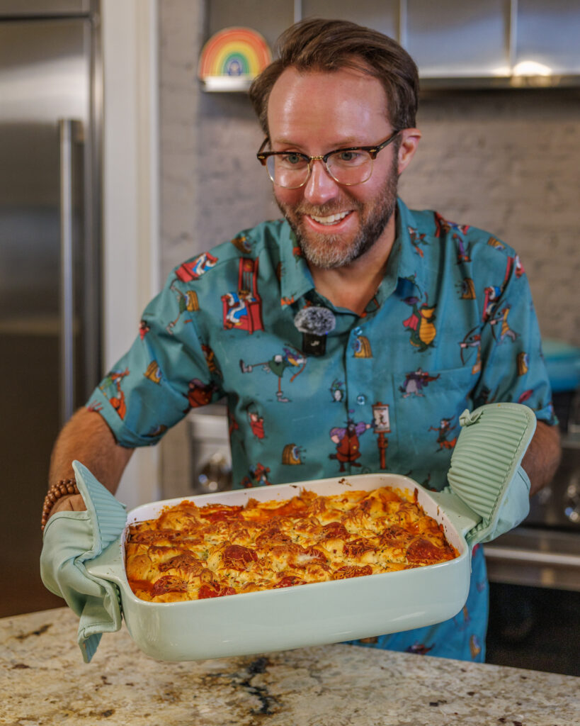 Matthew Bounds, creator of Your Barefoot Neighbor, takes his Pizza Bubble Bake dish out of the oven