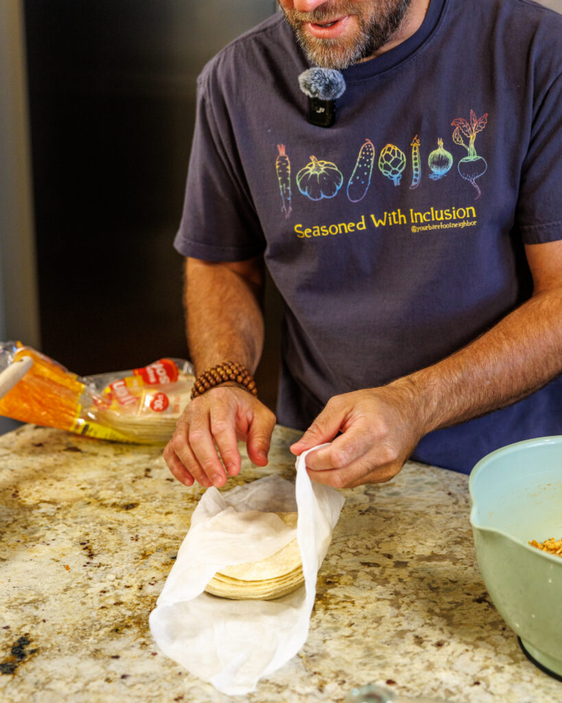 Matthew Bounds, creator of Your Barefoot Neighbor, prepares tortillas for his Shortcut Air Fryer Taquitos