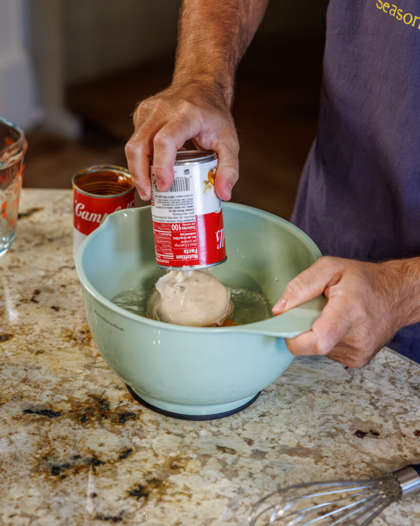 Matthew Bounds, creator of Your Barefoot Neighbor, prepares ingredients for his Slow Cooker Chicken & Gravy