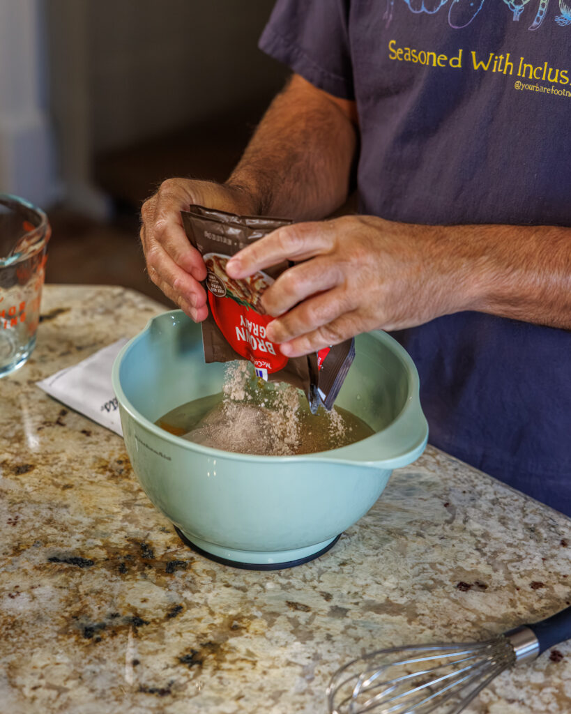 Matthew Bounds, creator of Your Barefoot Neighbor, prepares ingredients for his Slow Cooker Chicken & Gravy
