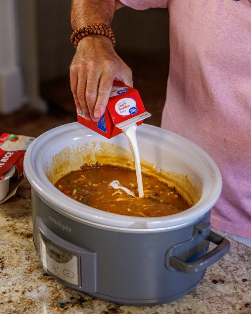 Matthew Bounds, creator of Your Barefoot Neighbor, prepares ingredients for his Slow Cooker Chicken & Gravy