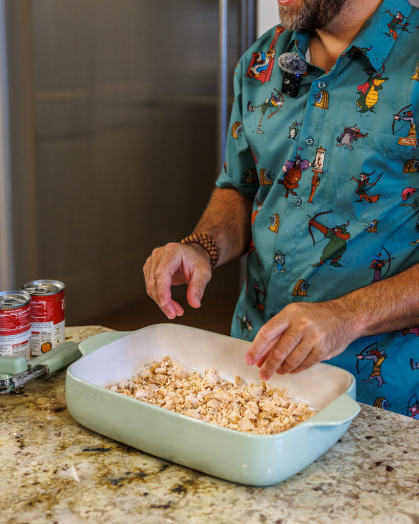 Matthew Bounds, creator of Your Barefoot Neighbor, preps a 9x13 dish for his Tater Tot Chicken Casserole