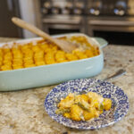 Matthew Bounds, creator of Your Barefoot Neighbor's Tator Tot Chicken Casserole sits in a dish on the kitchen counter
