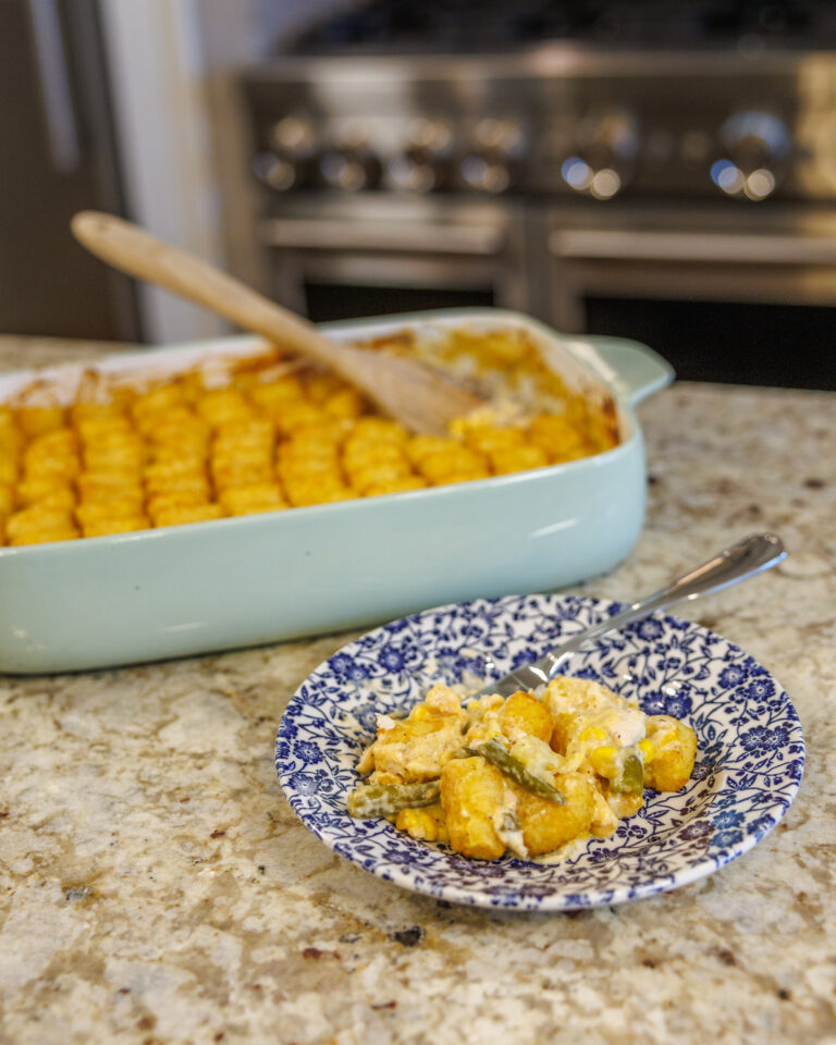 Matthew Bounds, creator of Your Barefoot Neighbor's Tator Tot Chicken Casserole sits in a dish on the kitchen counter
