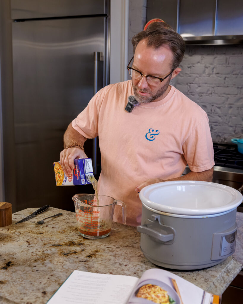 Matthew Bounds, creator of Your Barefoot Neighbor, adds ingredients to the Crockpot for his Lemon Sun Dried Tomato Chicken